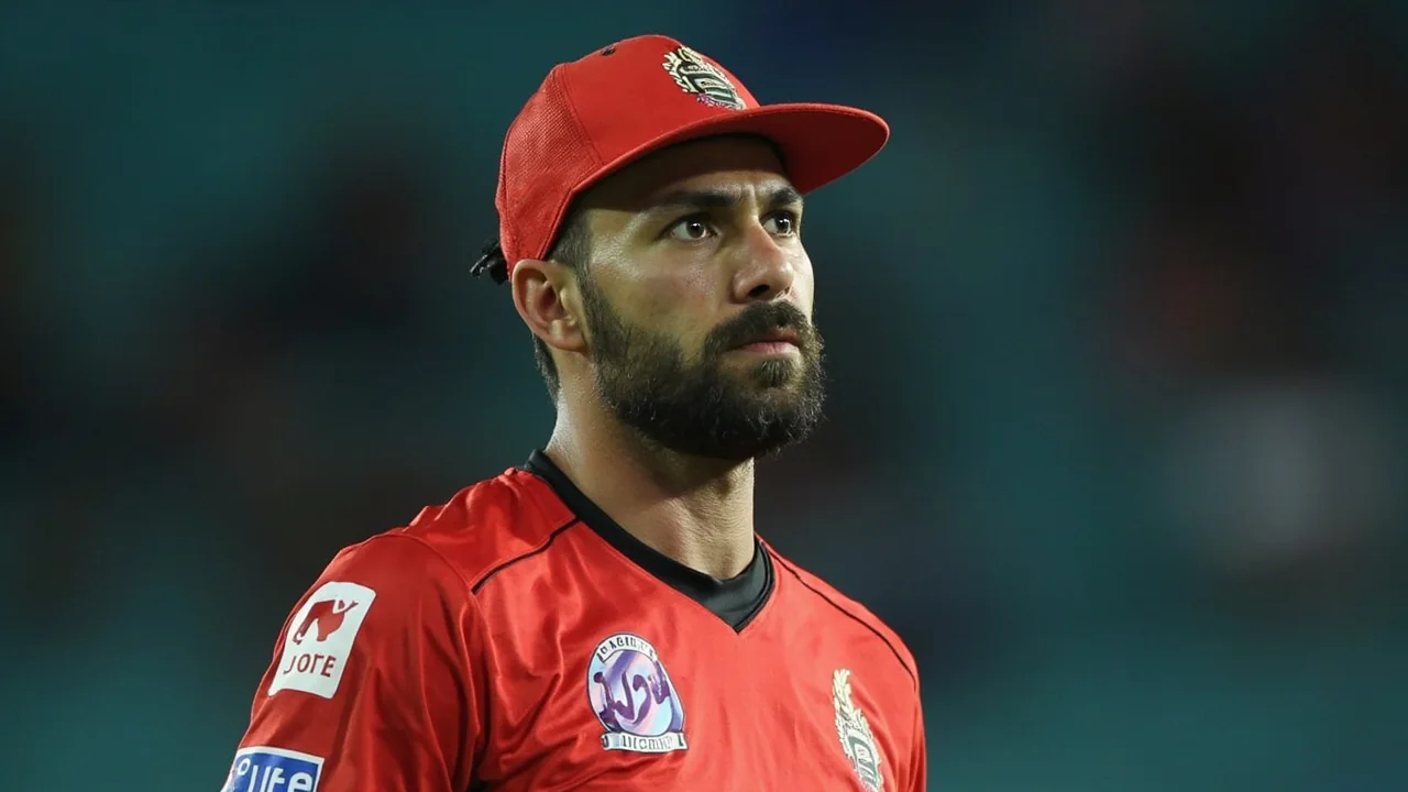 Editorial close of a West Indian wicketkeeper-batter setting up at the crease under evening Caribbean light, framing the Shai Hope captain read for CPL 2026 Match 11